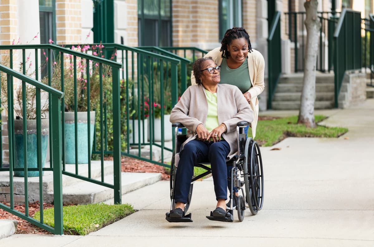 Caregiver discussing care plan with a client